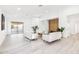 Bright living room with light wood floors, ceiling fan, and comfy sofas at 23637 N 22Nd St, Phoenix, AZ 85024