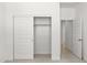 Spacious closet with sliding doors and hanging rod at 23969 W Cocopah St, Buckeye, AZ 85326