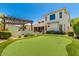 Landscaped backyard with putting green at 2976 E Cullumber St, Gilbert, AZ 85234