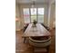 Kitchen dining area with farmhouse table and chairs at 2976 E Cullumber St, Gilbert, AZ 85234