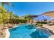 Refreshing pool with a rock waterfall feature at 2976 E Cullumber St, Gilbert, AZ 85234
