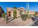 Charming desert home with cacti and well-maintained landscaping at 3336 N Saffron St, Mesa, AZ 85215