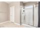 Bathroom with a large walk-in shower and tile flooring at 3583 N Brooklyn Dr, Buckeye, AZ 85396