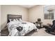 Bedroom with a comfortable bed, desk, and chair at 3583 N Brooklyn Dr, Buckeye, AZ 85396