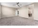 Spacious bedroom with ensuite bathroom access and carpet flooring at 3583 N Brooklyn Dr, Buckeye, AZ 85396