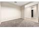 Spacious bedroom with neutral decor and carpet at 3583 N Brooklyn Dr, Buckeye, AZ 85396