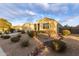 House exterior showcasing a landscaped yard with a rock pathway at 3583 N Brooklyn Dr, Buckeye, AZ 85396