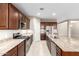 Spacious kitchen featuring granite countertops and stainless steel appliances at 3583 N Brooklyn Dr, Buckeye, AZ 85396