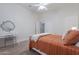 Bedroom with full bed, desk and window with plantation shutters at 4135 E Hale Cir, Mesa, AZ 85205