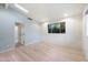 Bedroom with light wood floors and skylights at 4222 E Mcdonald Dr, Paradise Valley, AZ 85253