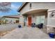 Inviting front porch with seating area and terracotta tile flooring at 44192 W Canyon Creek Dr, Maricopa, AZ 85139