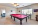 Game room with pool table and additional seating at 44192 W Canyon Creek Dr, Maricopa, AZ 85139
