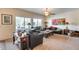 Living room with leather sofas and southwestern decor at 44192 W Canyon Creek Dr, Maricopa, AZ 85139