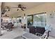 Relaxing covered patio with seating area, providing shade and comfort at 44192 W Canyon Creek Dr, Maricopa, AZ 85139