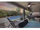 Relaxing patio features a pool view and seating area at 44192 W Canyon Creek Dr, Maricopa, AZ 85139