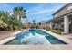 Inviting pool with spacious patio and landscape at 44192 W Canyon Creek Dr, Maricopa, AZ 85139