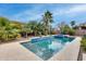 Relaxing pool area with ample space for lounging and entertaining at 44192 W Canyon Creek Dr, Maricopa, AZ 85139