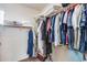 Spacious walk-in closet with ample shelving and hanging space at 44192 W Canyon Creek Dr, Maricopa, AZ 85139