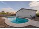 Beautiful kidney-shaped pool surrounded by gravel at 4518 W Chicago St, Chandler, AZ 85226