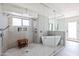 Large bathroom with walk-in shower, soaking tub, and glass enclosure at 5112 N 35Th St, Phoenix, AZ 85018