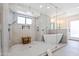 Large bathroom with walk-in shower, soaking tub, and glass enclosure at 5112 N 35Th St, Phoenix, AZ 85018