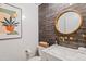 Stylish powder room, featuring marble vanity and dark tile at 5112 N 35Th St, Phoenix, AZ 85018