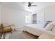 Relaxing bedroom with a queen bed, chair, and large closet at 5112 N 35Th St, Phoenix, AZ 85018