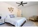 Serene bedroom with a queen bed and unique wall decor at 5112 N 35Th St, Phoenix, AZ 85018