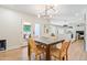 Bright dining area with modern table and access to backyard at 5112 N 35Th St, Phoenix, AZ 85018