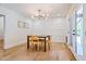 Modern dining room with light wood floors and a stylish table at 5112 N 35Th St, Phoenix, AZ 85018