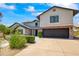 Two-story home with brick accents and a large garage at 5112 N 35Th St, Phoenix, AZ 85018