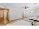 Bright hallway with light wood floors and access to bedrooms at 5112 N 35Th St, Phoenix, AZ 85018