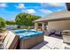 Private hot tub with covered patio furniture and grill at 5112 N 35Th St, Phoenix, AZ 85018