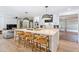 Modern kitchen featuring a large island and stainless steel appliances at 5112 N 35Th St, Phoenix, AZ 85018