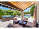 Relaxing patio area with wicker furniture and hot tub view at 5112 N 35Th St, Phoenix, AZ 85018