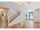 Elegant staircase with black metal railing and light wood steps at 5112 N 35Th St, Phoenix, AZ 85018