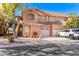 Two-story condo building with attached garage and landscaping at 5450 E Mclellan Rd # 234, Mesa, AZ 85205