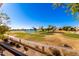 Stunning view of a lush golf course and lake from a condo at 5450 E Mclellan Rd # 234, Mesa, AZ 85205