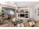 Spacious living room with a cozy sitting area and built-in entertainment center at 5450 E Mclellan Rd # 234, Mesa, AZ 85205