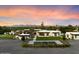 Aerial view of a modern home with a large backyard, pool, and pickleball court at 5823 N Invergordon Rd, Paradise Valley, AZ 85253