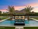Resort-style pool and spa with outdoor entertainment area and mountain views at 5823 N Invergordon Rd, Paradise Valley, AZ 85253