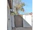 Backyard access gate with block wall at 7056 W Caron Dr, Peoria, AZ 85345