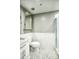 Clean bathroom with white subway tile and hexagon floor at 706 E Washington St # 202, Phoenix, AZ 85034