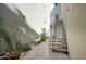 Private courtyard with stairs leading to upper levels, offering a tranquil space at 706 E Washington St # 202, Phoenix, AZ 85034