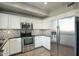 Modern kitchen with stainless steel appliances and granite countertops at 706 E Washington St # 202, Phoenix, AZ 85034