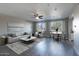 Open living and dining area with contemporary furniture and hardwood floors at 706 E Washington St # 202, Phoenix, AZ 85034