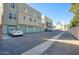 Exterior view of parking area with garage access at 706 E Washington St # 202, Phoenix, AZ 85034