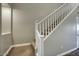 Interior staircase with white railings, connecting different levels of the home at 706 E Washington St # 202, Phoenix, AZ 85034