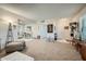 Living room with an open floor plan and view to entryway at 9209 W Glen Oaks N Cir, Sun City, AZ 85351