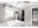 Bedroom with built-in shelving and window coverings at 952 S Esperanza Ave, Mesa, AZ 85208